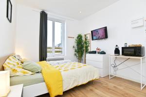 Appartements TC Residences - Charmant Appartement : photos des chambres
