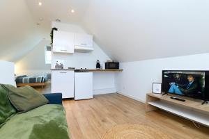 Appartements TC Residences - Charmant Appartement : photos des chambres