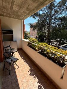 Appartamento Centro Città con Posto Auto e Palestra