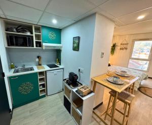 Appartements Jungle - Vue - Clim - Wifi : photos des chambres