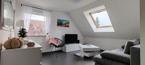 Appartements Au coeur des vignes : photos des chambres