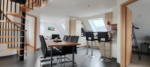 Appartements Au coeur des vignes : photos des chambres