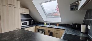 Appartements Au coeur des vignes : photos des chambres