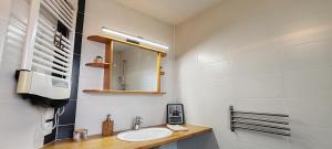 Appartements Au coeur des vignes : photos des chambres