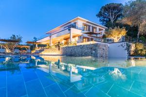 Villas VILLA CASADELMAR- 7 chambres, 16 personnes, vue mer, piscine, appartement, acces plage, terrain petanque : photos des chambres