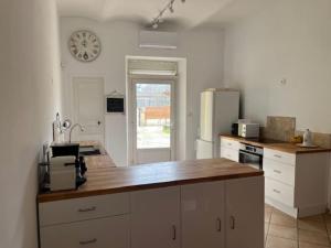 Maisons de vacances L-Ostal de Terralha avec piscine au centre du village : photos des chambres