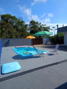 Casa com Piscina e ampla area de festas