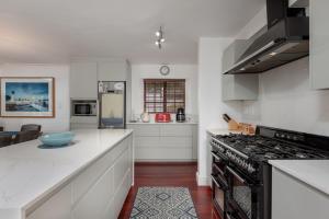 Die Rietdak - Reetdachhaus mit vier Schlafzimmern