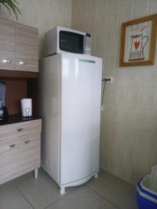 Pé na areia, frente mar, wi-fi e garagem coberta no Caiçara - PG