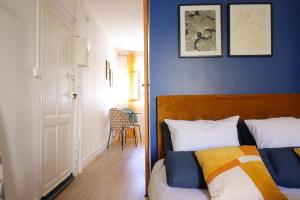 Appartements Le Neo - Studio chic avec sa cour privative et fibre : photos des chambres
