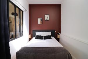 Appartements Le Patio - Spacieux T3 avec climatisation et jardin privatif : photos des chambres