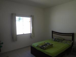 CASA p TEMPORADA COM PISCINA ACONCHEGANTE EXCELENTE LOCALIZAÇÃO