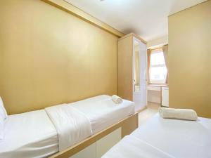 Artsy 2BR Apartment at Parahyangan Residence By Travelio