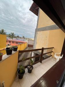 Flat na beira da praia
