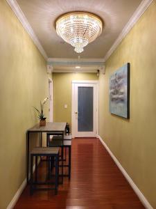 3 bedroom guest suite first floor unit with nice patio area right next to the MrC Hotel 10 minutes from Rodeo Drive Washer Dryer WIFI and more