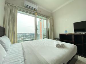 Minimalist Spacious Studio Room at Apartment Galeri Ciumbuleuit 1 By Travelio