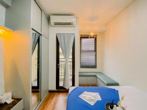Cozy Studio Apartment at Transpark Cibubur By Travelio