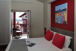 Hotels Hotel du Fronton : photos des chambres