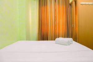 Comfortable 2BR at Titanium Square Apartment By Travelio