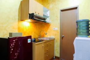 Comfortable 2BR at Titanium Square Apartment By Travelio