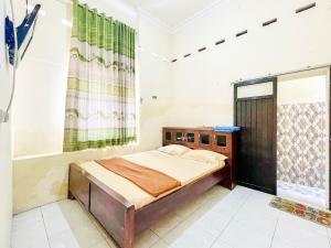 Wisma Air Mancur Malang Syariah Mitra RedDoorz