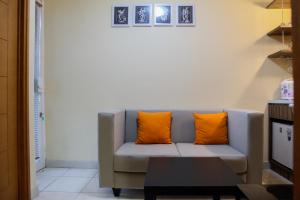 Modern 1BR with Sofa Bed at Cinere Bellevue Suites Apartment By Travelio