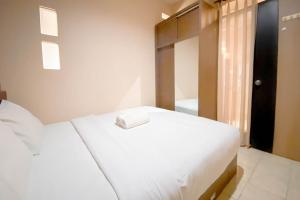 Spacious 1BR Classic at The Edge Bandung Apartment By Travelio