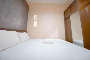 Spacious 1BR Classic at The Edge Bandung Apartment By Travelio
