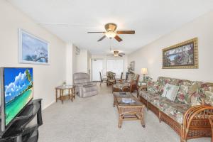 Beachfront condo with pool and ocean view from balcony
