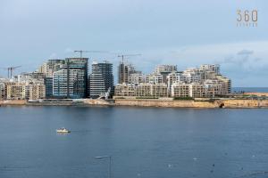 Unique seafront Loft overlooking Vallettas views by 360 Estates