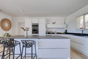 Villas Superbe villa au calme avec vue : photos des chambres