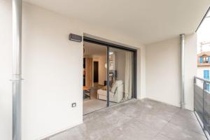 Appartements ANNECITY - Appartement confortable pres du centre ville : photos des chambres