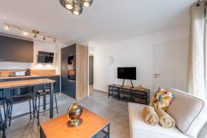 Appartements ANNECITY - Appartement confortable pres du centre ville : photos des chambres