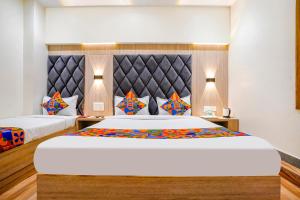 FabHotel Riza International - Nr Nesco Exhibition Centre