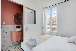 Appartements Le Mona - Entre Paris & Disney - Wifi : photos des chambres