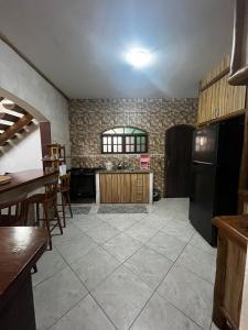 Casa à 3 minutos a pé da Praia, com churrasqueira!