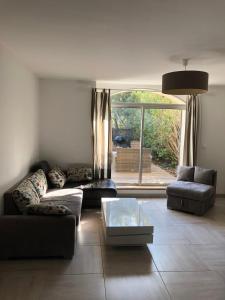 Maisons de vacances Maison au coeur du village : photos des chambres