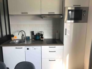 Appartements Studio spacieux bord de mer : photos des chambres