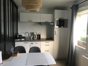 Appartements Studio spacieux bord de mer : photos des chambres