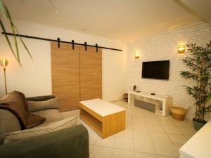 Appartements Bouc et Lumieres : photos des chambres