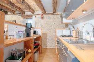 Maisons de vacances Coeur de village, maison pour 8 avec piscine : photos des chambres