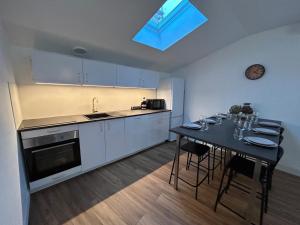 Appartements Le cosy clem : photos des chambres