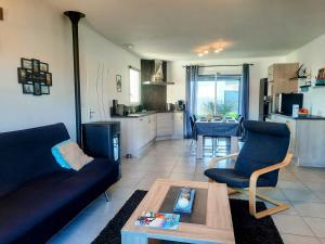 Maisons de vacances Les Merisiers - Maison moderne avec jardin : photos des chambres