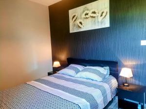 Maisons de vacances Les Merisiers - Maison moderne avec jardin : photos des chambres