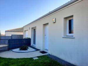 Maisons de vacances Les Merisiers - Maison moderne avec jardin : photos des chambres