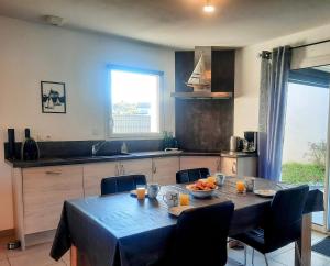 Maisons de vacances Les Merisiers - Maison moderne avec jardin : photos des chambres