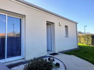 Maisons de vacances Les Merisiers - Maison moderne avec jardin : photos des chambres