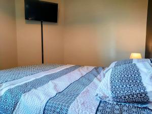 Maisons de vacances Les Merisiers - Maison moderne avec jardin : photos des chambres