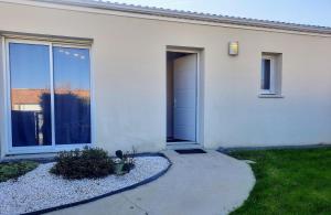 Maisons de vacances Les Merisiers - Maison moderne avec jardin : photos des chambres