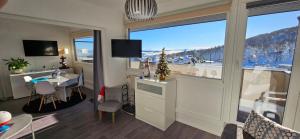 Appartements Appartement terrasse pied des pistes coeur station wifi : photos des chambres